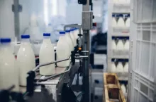 &lt;p&gt;A selective focus shot of complete milk bottling line in a factory&lt;/p&gt;